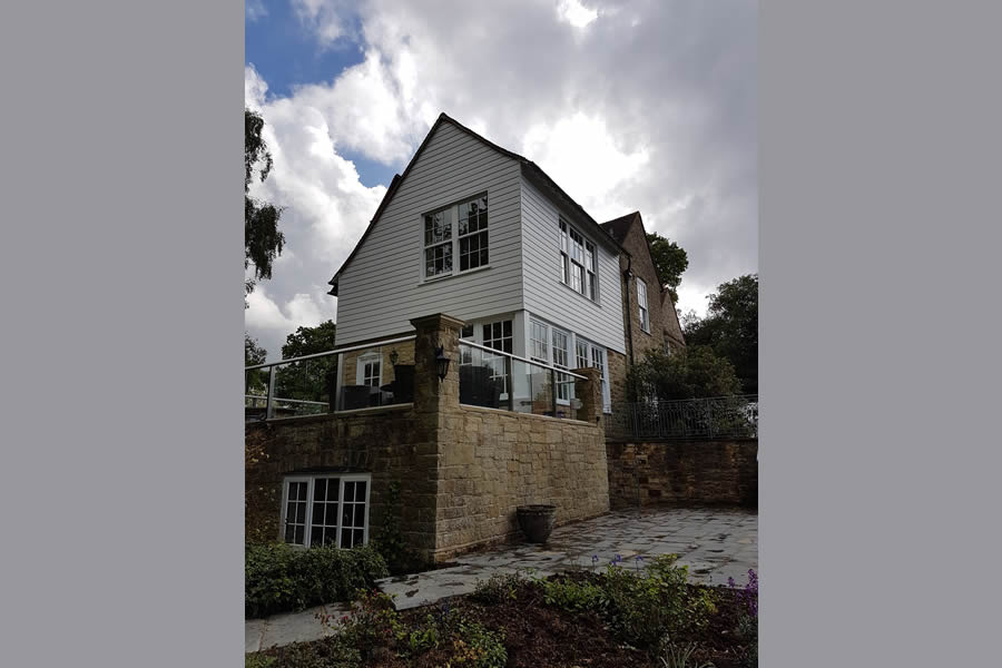 The new balcony with glass balustrade