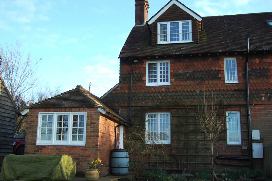 Before: Rear view of house